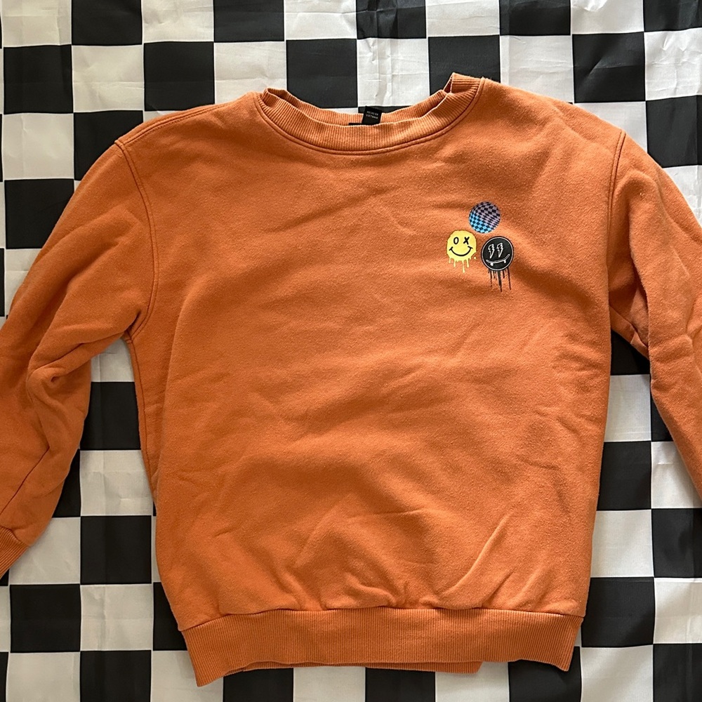Art Class Orange Sweatshirt with Drip Smiley & Checker Design 6/7